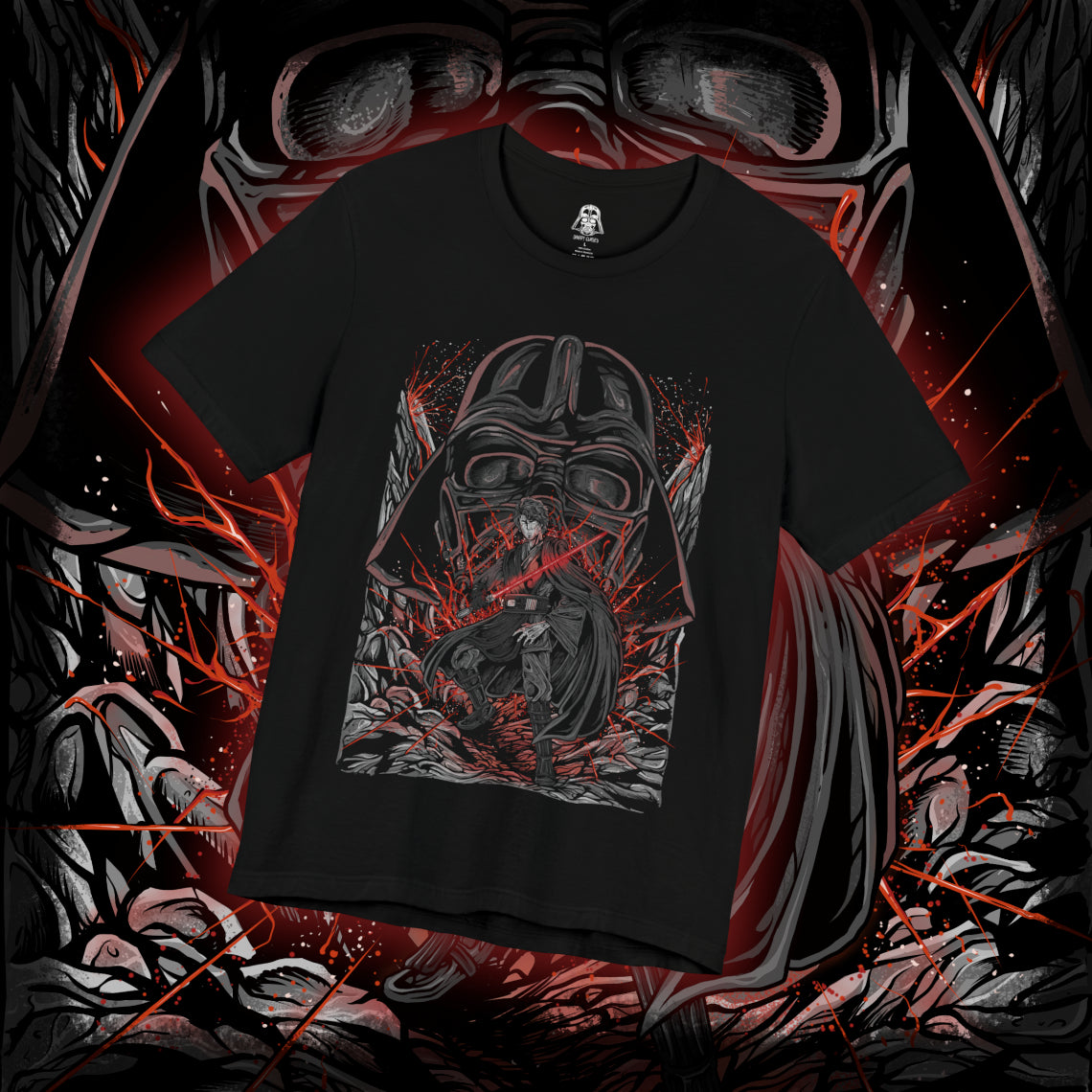 Thumbnail of a T-Shirt design of Anakin Skywalker and Darth Vader from Star Wars, standing divided by light and shadow as blue and red lightsabers glow against a darkened battlefield. Anakin’s determined gaze contrasts with Vader’s imposing armored form, symbolizing the tragic fall of a hero. The design captures the transformation, inner conflict, and destiny that reshaped the galaxy.
