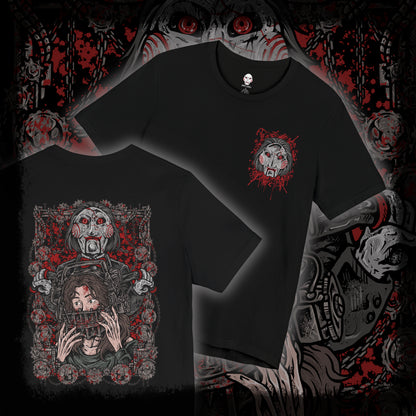 Thumbnail of a T-Shirt artwork depicting Billy the Puppet emerging from darkness with his tricycle positioned beneath a harsh spotlight. Shadows stretch across the floor while old television screens and mechanical traps fill the background. This design reflects the disturbing symbolism of Jigsaw’s messenger, embodying dread, manipulation, and the cruel tests that define the Saw franchise.