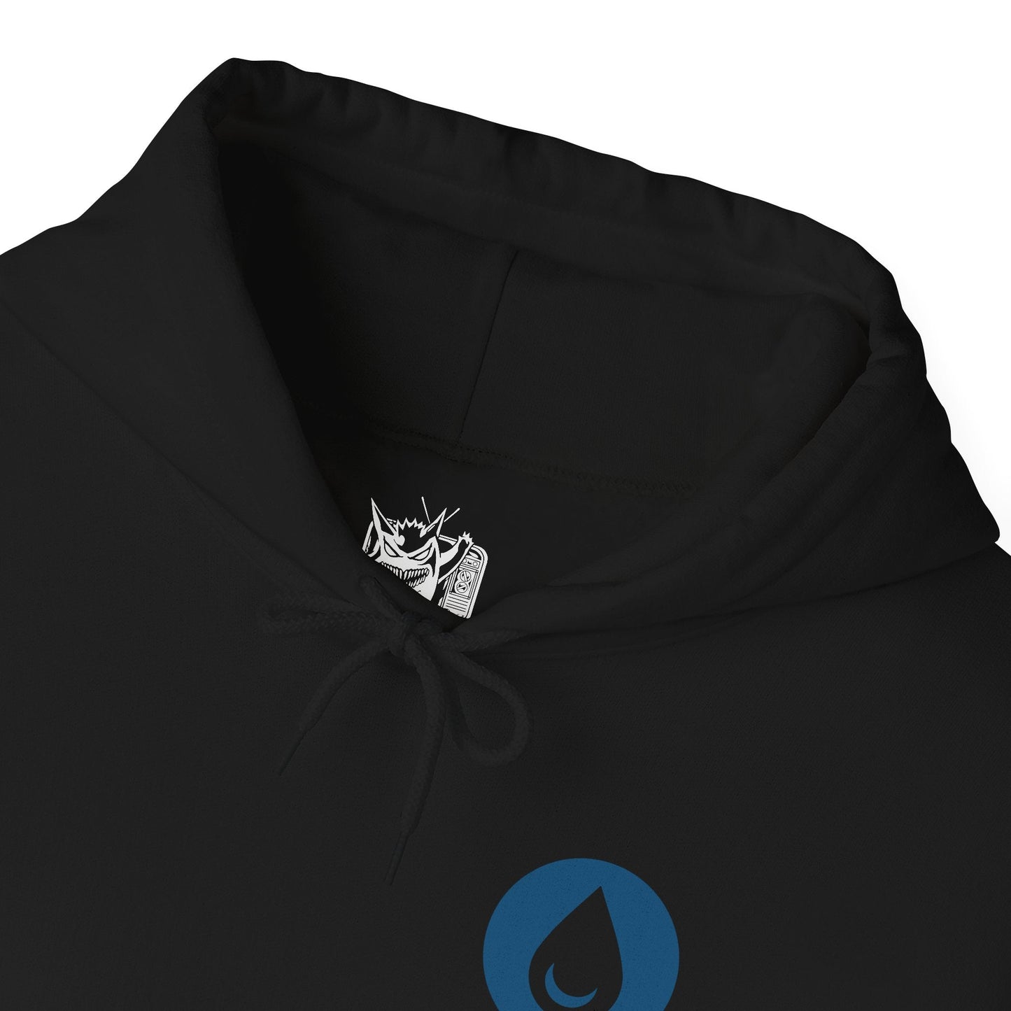 Folded Hooded Sweatshirt of powerful Water-type Pokémon commanding the sea amid rolling waves, ocean spray, and glowing aquatic energy. Schools of fish swim beneath the surface while storm clouds gather over the horizon, emphasizing the immense power of water in nature. The composition highlights fluid movement, elemental strength, and the timeless connection between Water-type Pokémon and their aquatic world.