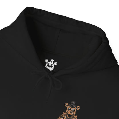 Folded Hooded Sweatshirt of Freddy Fazbear, Bonnie, Chica, and Foxy emerging from the shadows of Freddy Fazbear's Pizzeria, their glowing eyes piercing the darkness as abandoned party tables and colorful balloons contrast with the eerie setting. Static flickers across security monitors while the stage stands silent behind them. The composition emphasizes animatronic horror, suspense, and the unforgettable cast that defines Five Nights at Freddy's.