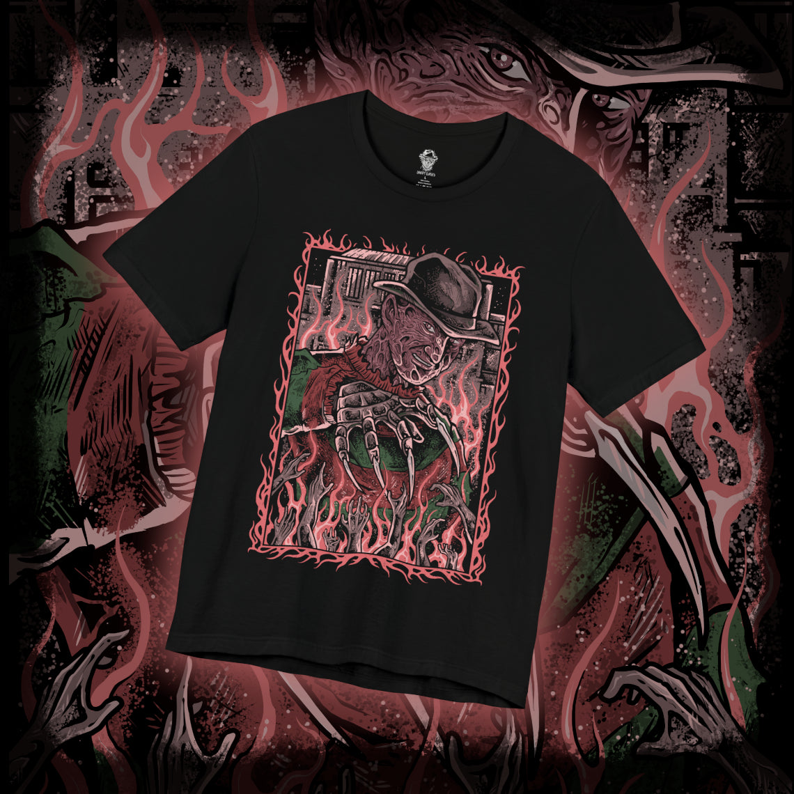 Thumbnail of a T-Shirt design of Freddy Krueger from A Nightmare on Elm Street, emerging from a nightmare-filled darkness with his bladed glove extended toward the viewer. His burned face twists into a sinister grin beneath a worn fedora while red and green stripes fade into shadow behind him. The design captures dreamlike terror, psychological horror, and the unstoppable fear haunting Elm Street.