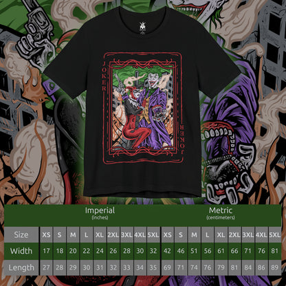 Size chart of a T-Shirt artwork depicting the Joker and Harley Quinn embracing chaos in the streets of Gotham City, with explosions, scattered poker chips, and purple-green smoke filling the background. The Joker flourishes a deck of cards while Harley balances her signature bat across her shoulders. This design reflects madness, rebellion, and the twisted bond that blurs the line between obsession, loyalty, and destruction.