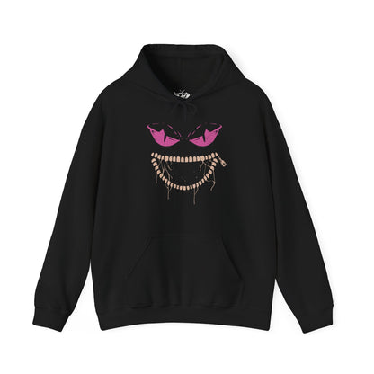 Image 4 of a Hooded Sweatshirt of Mega Banette floating against a stormy night sky, zipper jaw opened wide as purple shadow energy bursts outward. Its puppet-like frame twists with amplified curse power, symbolizing the unleashed grudge that defines its Mega form. The composition highlights eerie evolution, spectral aggression, and the darker side of Pokémon’s ghostly transformations.