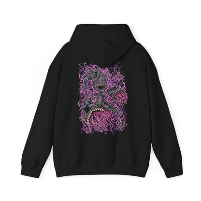 Image 5 of a Hooded Sweatshirt of Mega Banette floating against a stormy night sky, zipper jaw opened wide as purple shadow energy bursts outward. Its puppet-like frame twists with amplified curse power, symbolizing the unleashed grudge that defines its Mega form. The composition highlights eerie evolution, spectral aggression, and the darker side of Pokémon’s ghostly transformations.