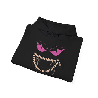 Image 6 of a Hooded Sweatshirt of Mega Banette floating against a stormy night sky, zipper jaw opened wide as purple shadow energy bursts outward. Its puppet-like frame twists with amplified curse power, symbolizing the unleashed grudge that defines its Mega form. The composition highlights eerie evolution, spectral aggression, and the darker side of Pokémon’s ghostly transformations.