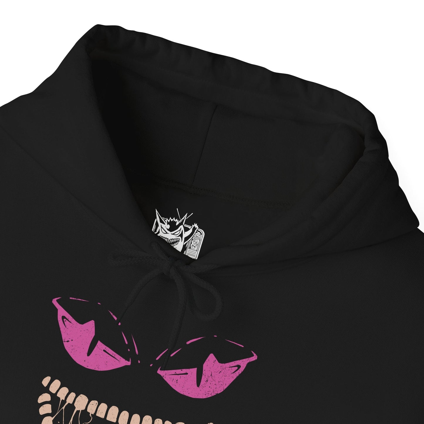 Folded Hooded Sweatshirt of Mega Banette floating against a stormy night sky, zipper jaw opened wide as purple shadow energy bursts outward. Its puppet-like frame twists with amplified curse power, symbolizing the unleashed grudge that defines its Mega form. The composition highlights eerie evolution, spectral aggression, and the darker side of Pokémon’s ghostly transformations.
