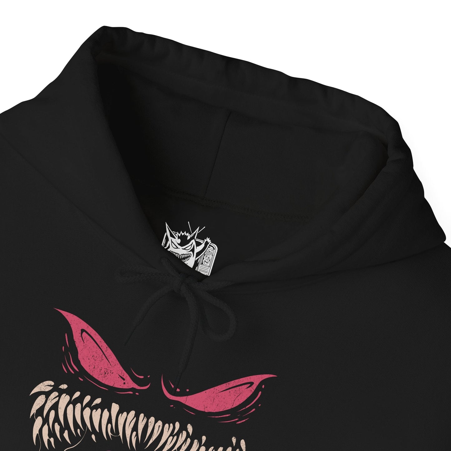 Folded Hooded Sweatshirt of the ghostly trio Gastly, Haunter, and Gengar hovering in a moonlit cemetery, their forms blending into swirling fog and shadows. Gastly’s gas pulses with purple haze, Haunter’s claws extend as if to strike, and Gengar’s grin radiates malevolent charm. The design emphasizes ghostly evolution, eerie playfulness, and the haunting charm that defines this classic Pokémon line.