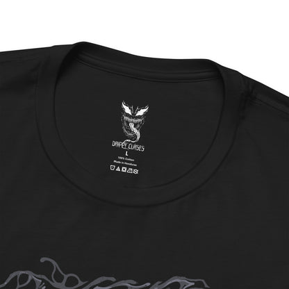 Folded T-Shirt design of Venom from Marvel, towering in darkness as the black symbiote stretches across his massive muscular body. Sharp teeth glisten beneath glowing eyes while his long tongue curls outward, dripping saliva onto cracked pavement below. The design captures Venom’s monstrous power, predatory nature, and the terrifying fusion between alien symbiote and human host.